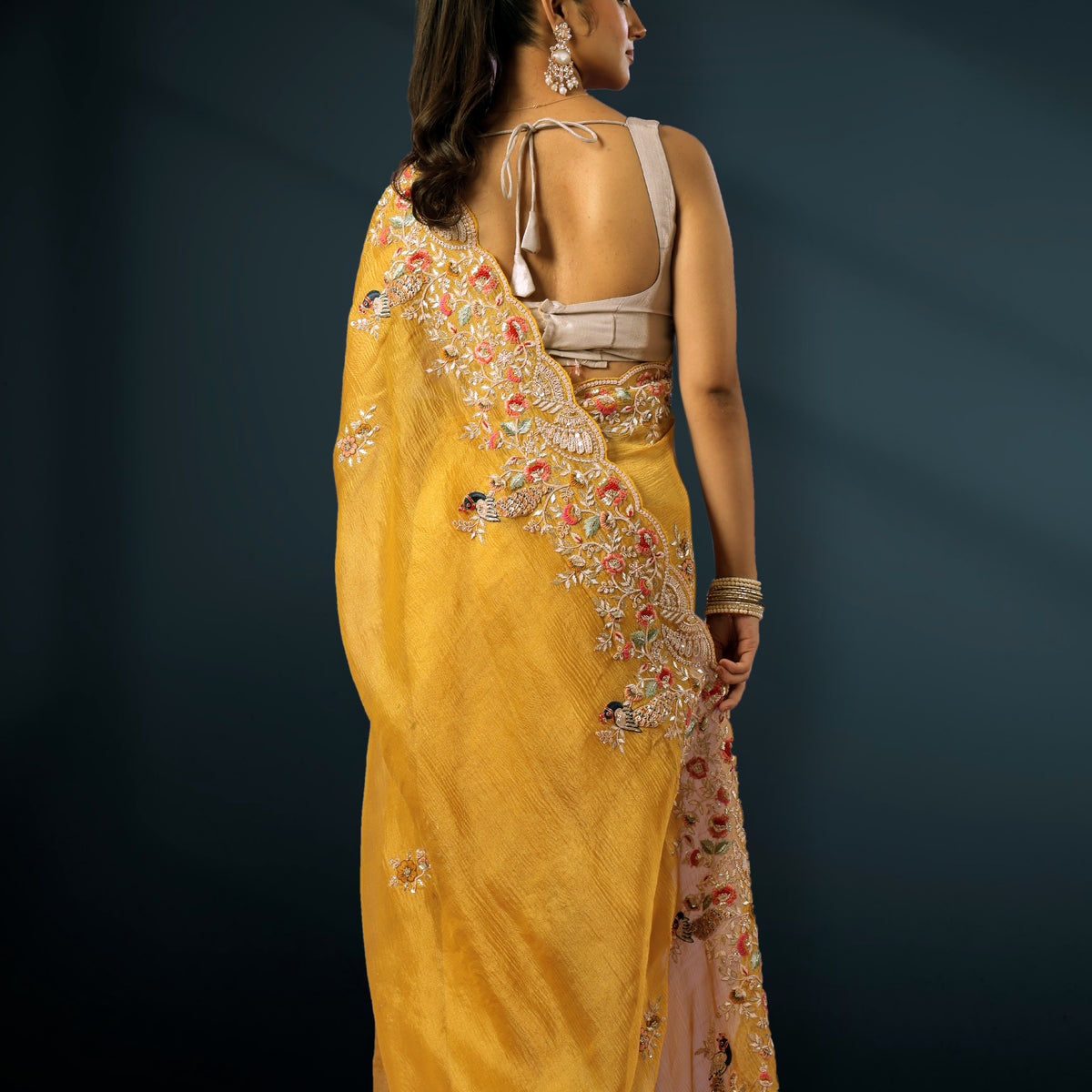 Ivory crush tissue resham & zardosi embroidered saree paired with  yellow blouse