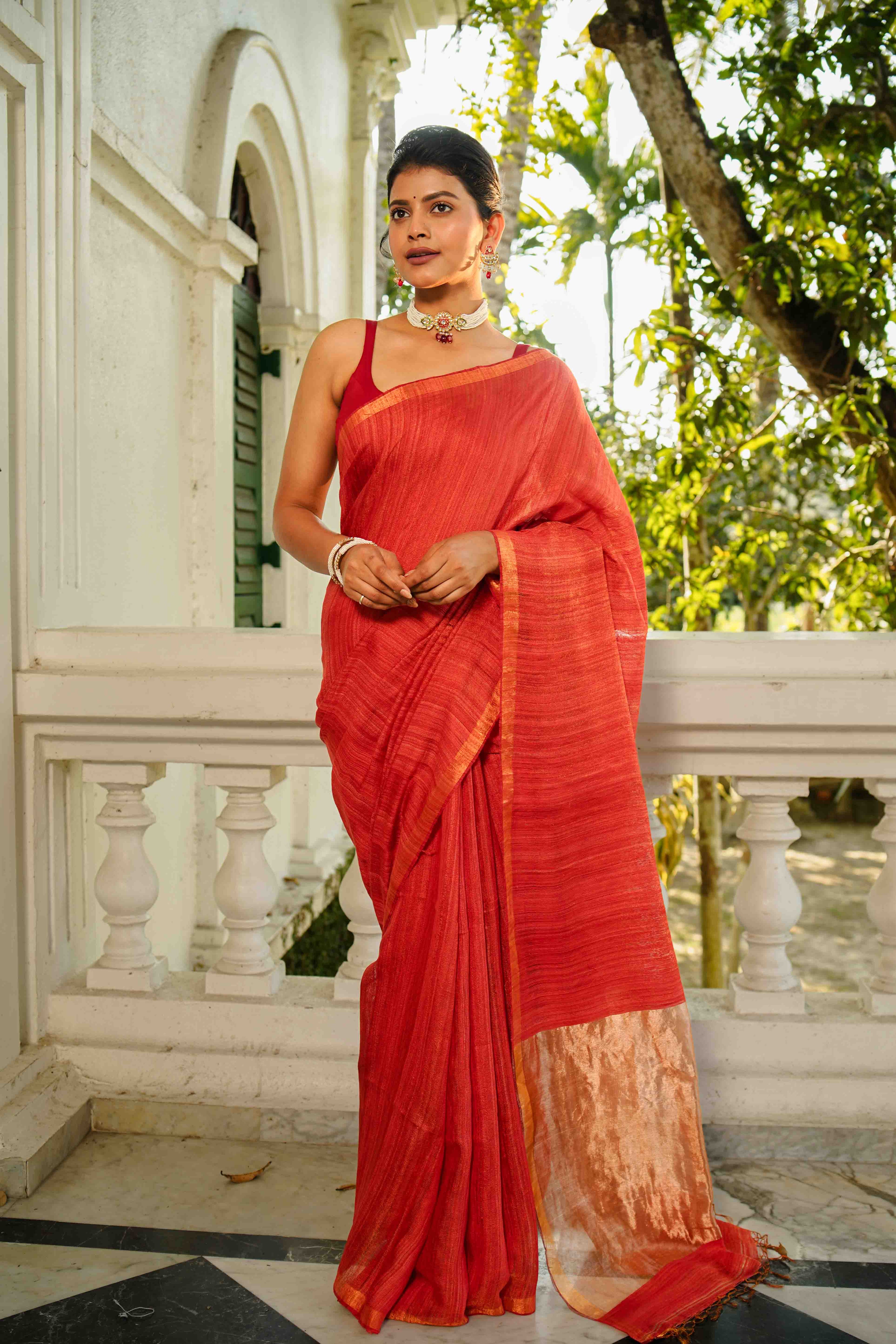 Rust Orange Tissue Matka Saree With Blouse Piece