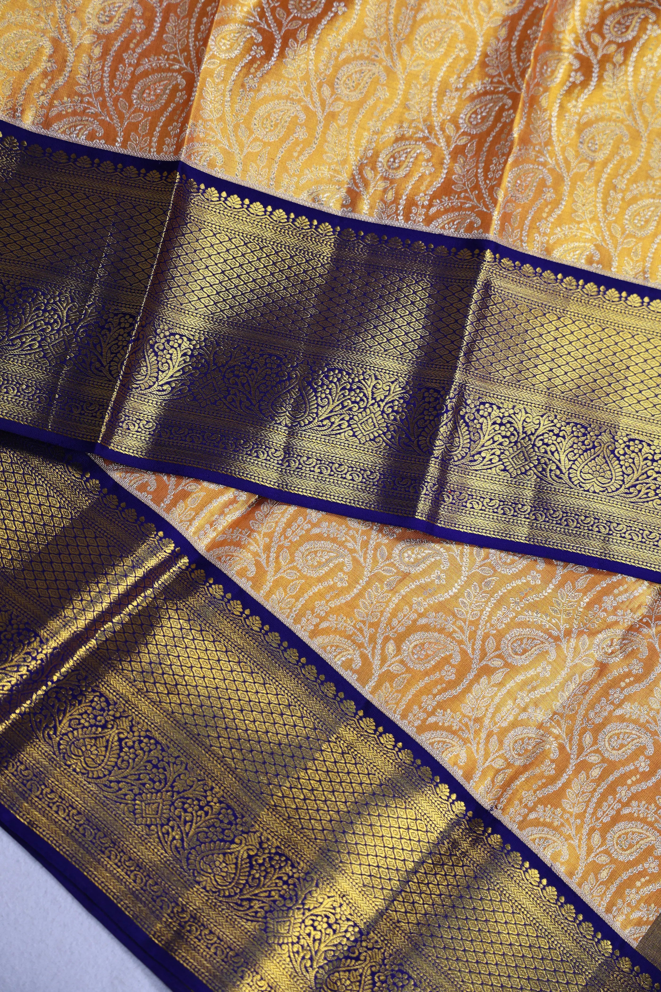 Orangish Gold Dark Purple Brocade Kanjivaram Saree With Blouse Piece