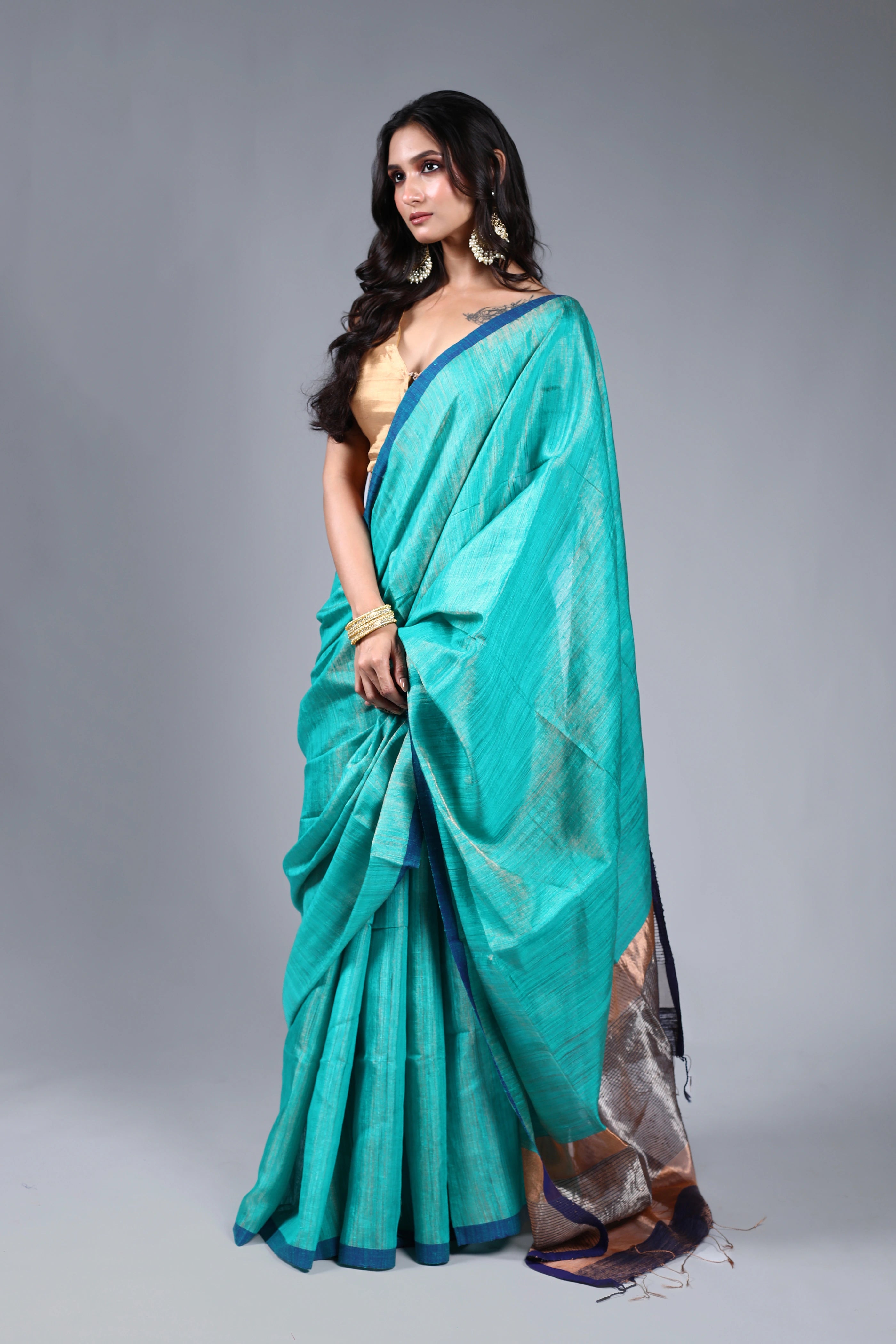 Teal Blue Tissue Matka Saree With Blouse Piece