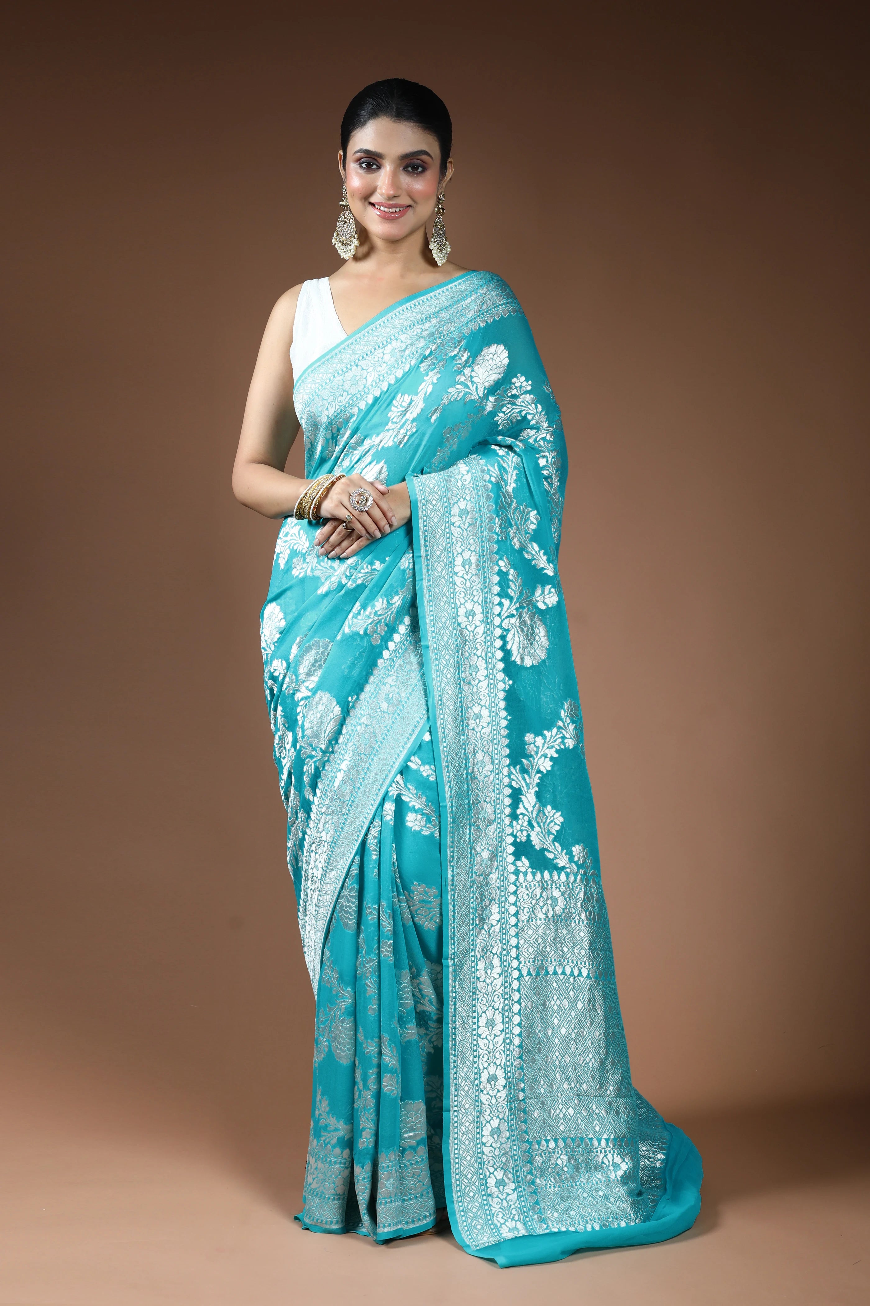 Sea Green Georgette Banarasi Saree with Blouse Piece