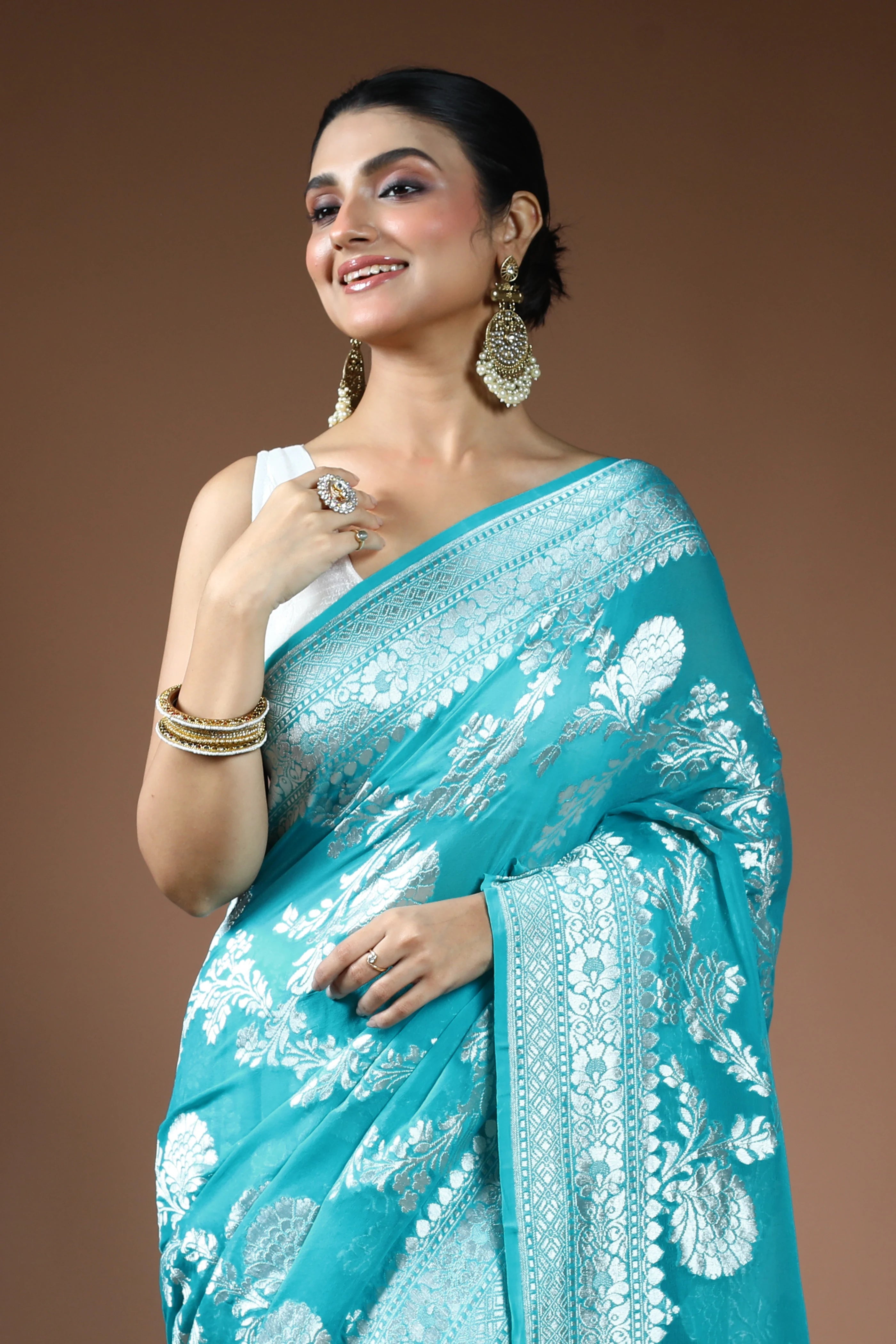 Sea Green Georgette Banarasi Saree with Blouse Piece