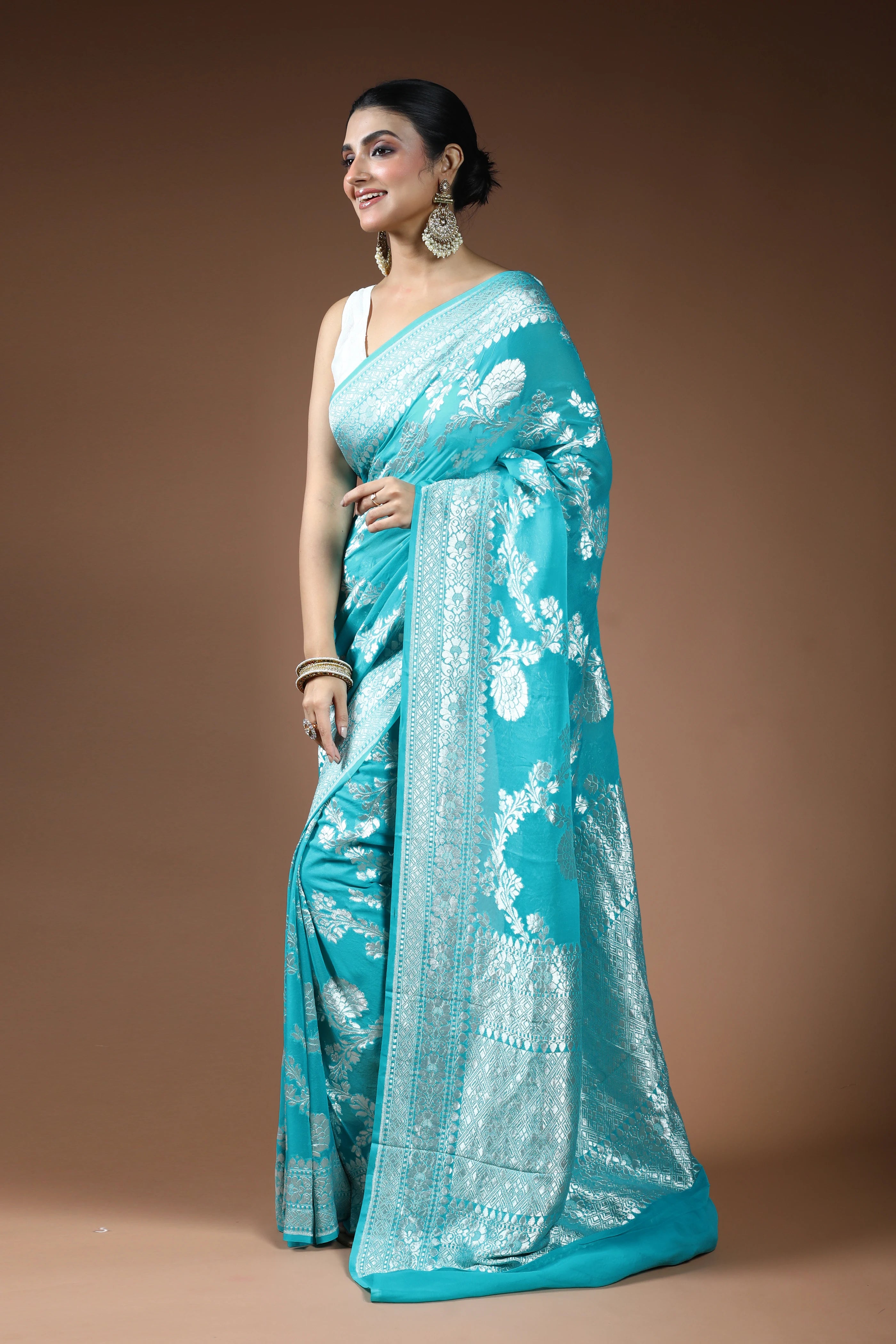 Sea Green Georgette Banarasi Saree with Blouse Piece